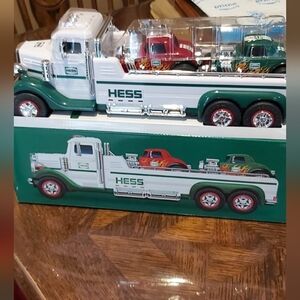 Toy troller truck with two cars